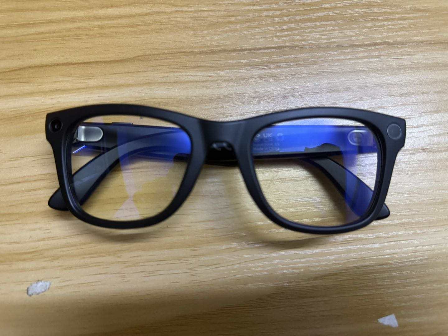 Smart glasses resting on a table